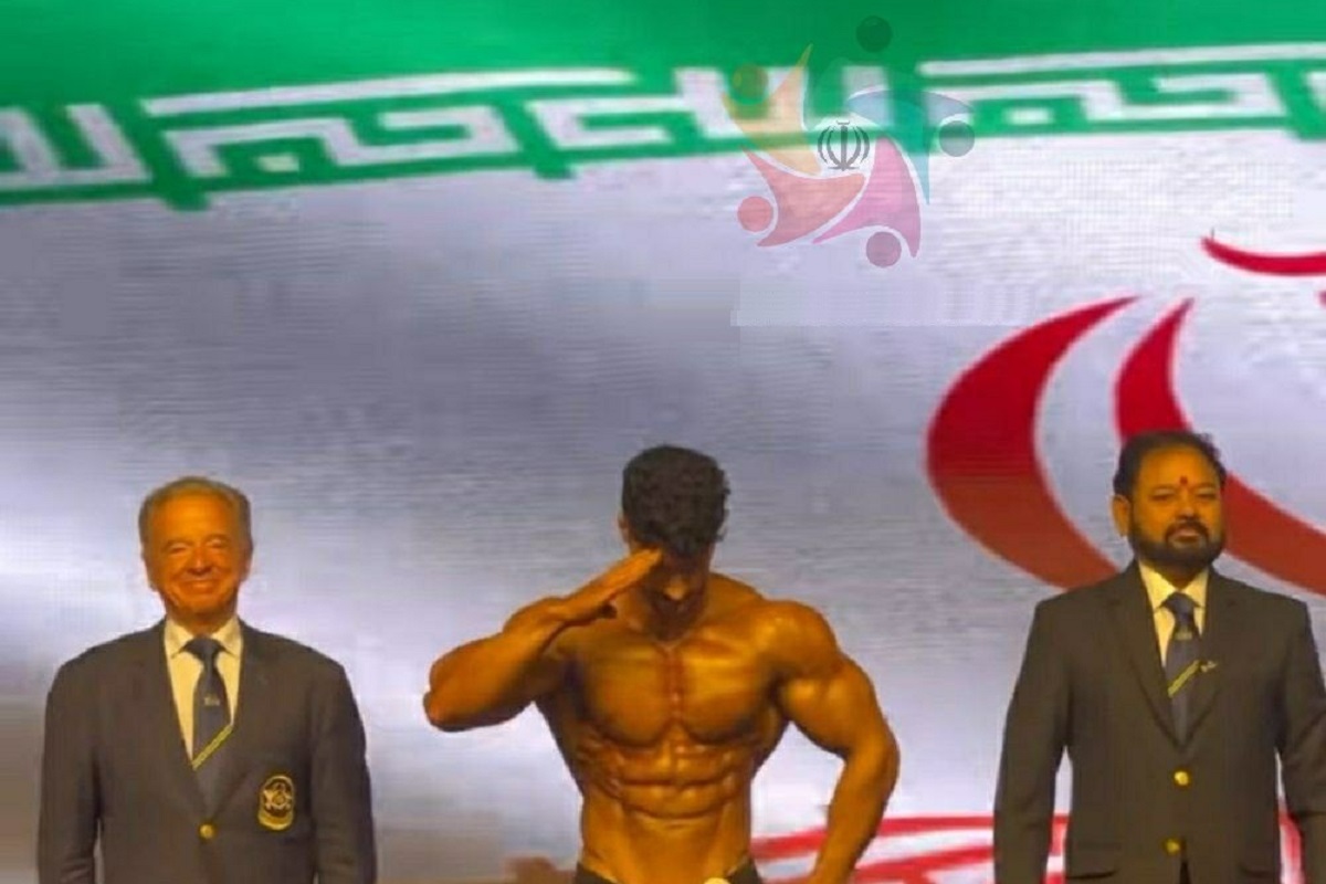 عکس| احترام نظامی قهرمان پرورش اندام آسیا به سرود ملی ایران | دیلی فوتبال